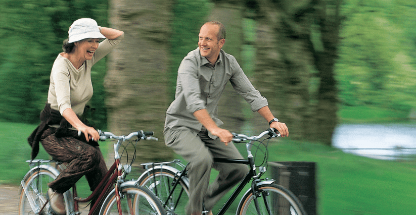 Couple having fun cycling