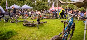 Image of bikes laying on the grass at an event