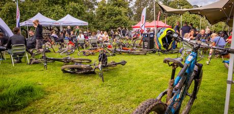 Image of bikes laying on the grass at an event